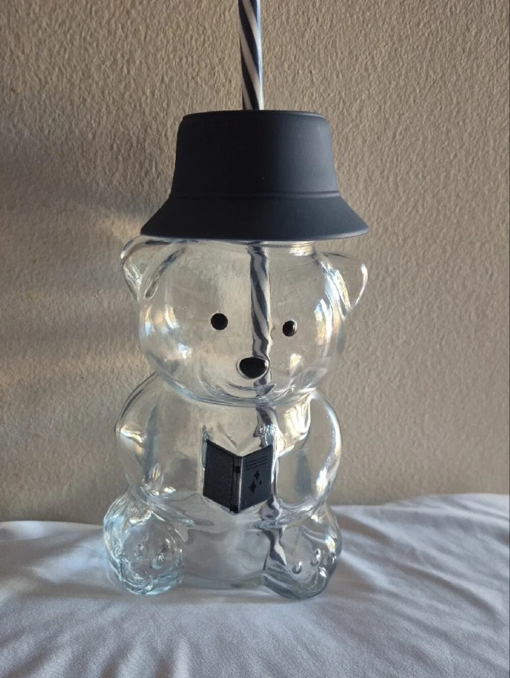 Clear Bear-Shaped Drinking Cup with Gray Lid and Striped Straw